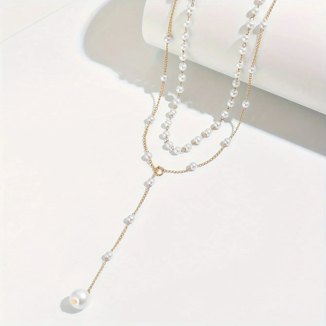 Collar de perlas en capas